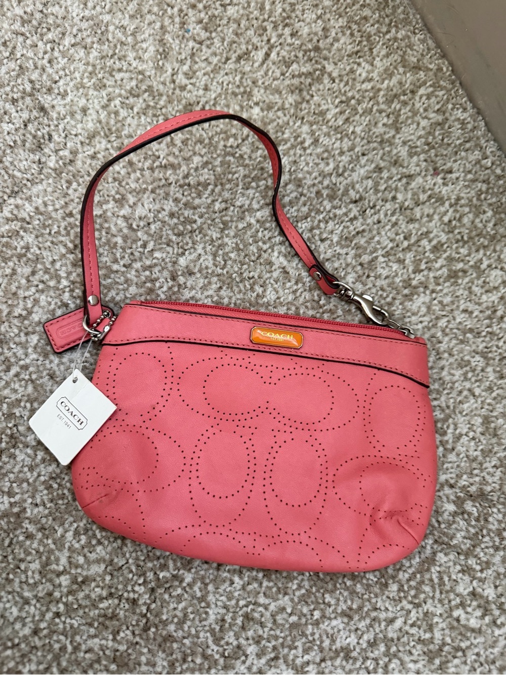 Coach Coral Pink Perforated Leather Wristlet with Strap